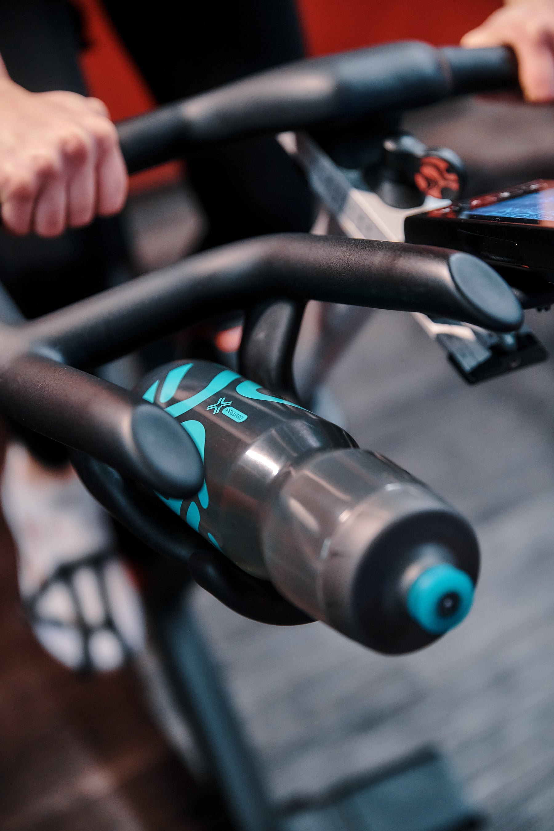 Fidlock Fidguard 750ml Antibacterial Bottle on an exercise bike