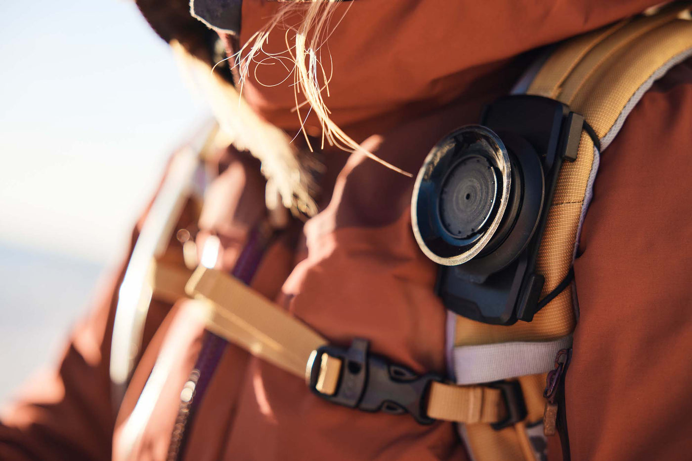 Fidlock Tex Base attached to backpack strap