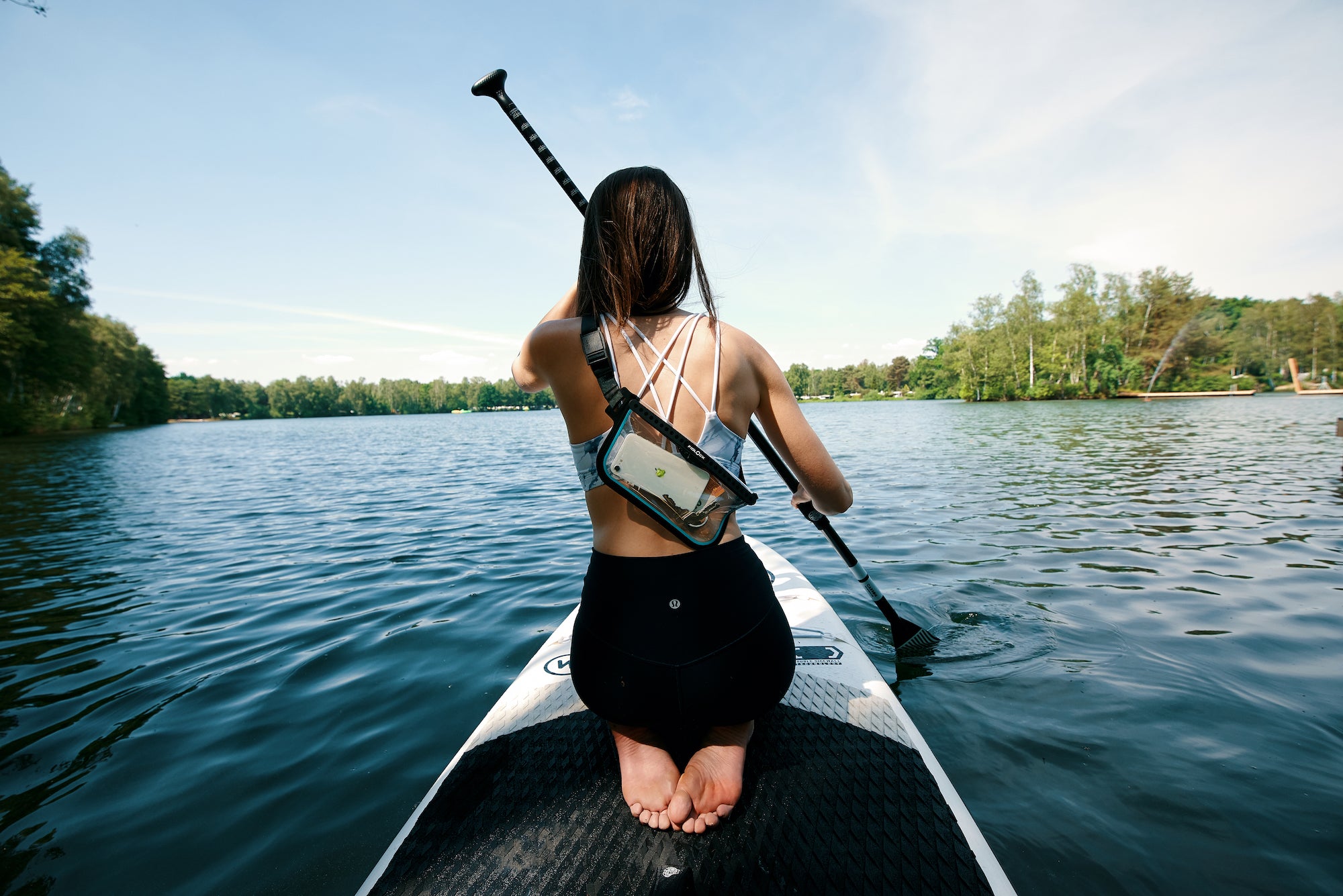 Fidlock Hermetic dry bag used by paddle boarder