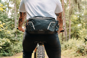 Mountain biker wearing Fidlock hip pack