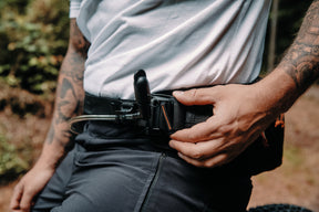 Fidlock hydration bladder equipped hip pack with magnetically attached drinking hose