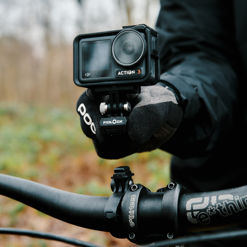 Fidlock PINCLIP Action Cam Mount connecting to bike handlebar